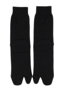 Maison Margiela women’s black knit tabi socks featuring a distinct split-toe design for comfortable wear