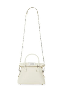 Maison Margiela women’s Classique micro bag in cream leather with silver chain strap and top handle minimalist design