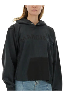 Maison Margiela women’s black cotton cropped hoodie with a subtle faded margiela logo across the chest