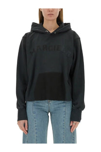 Maison Margiela women’s black cotton cropped hoodie with textured margiela logo and contrasting fabric panels front