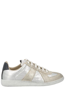 Maison Margiela women’s iridescent replica low-top sneaker in silver metallic and beige suede with white laces