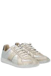 Maison Margiela women’s iridescent replica sneaker silver with silver metallic distressed finish and white laces