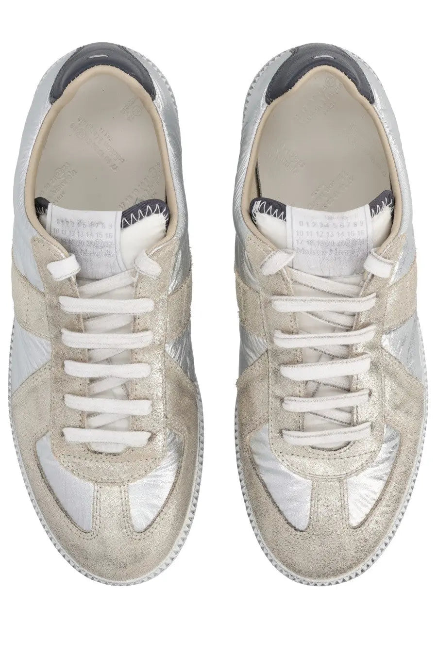 Maison Margiela women’s iridescent replica sneakers in silver metallic with distressed finish and white laces