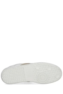 Maison Margiela women’s iridescent replica sneaker silver with white rubber sole featuring textured grid pattern and traction dots