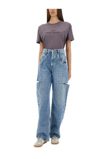 Maison Margiela women’s high-waisted blue denim jeans with distressed ripped knees for casual wear