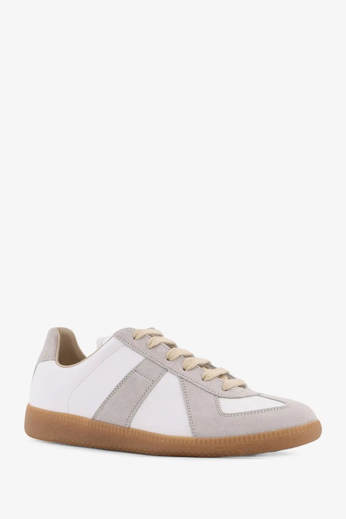 Maison Margiela women’s leather sneakers in white with light gray suede, beige laces, and tan rubber sole