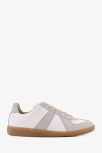 Maison Margiela women’s leather sneakers in white suede with light gray accents and tan rubber sole for casual wear