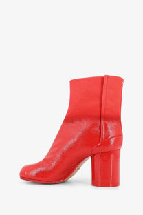 Vibrant red patent leather ankle boot with chunky block heel and glossy finish Maison Margiela women leather tabi boot
