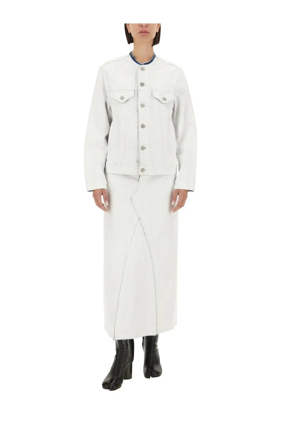 Maison Margiela women’s white denim jacket with silver buttons and front pockets paired with matching midi skirt