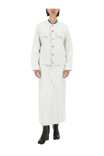 Maison Margiela women’s white denim jacket with silver buttons and front pockets paired with matching midi skirt
