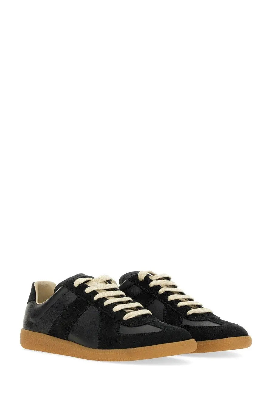 Maison Margiela women’s replica sneaker black with contrasting cream laces and tan rubber sole in leather material