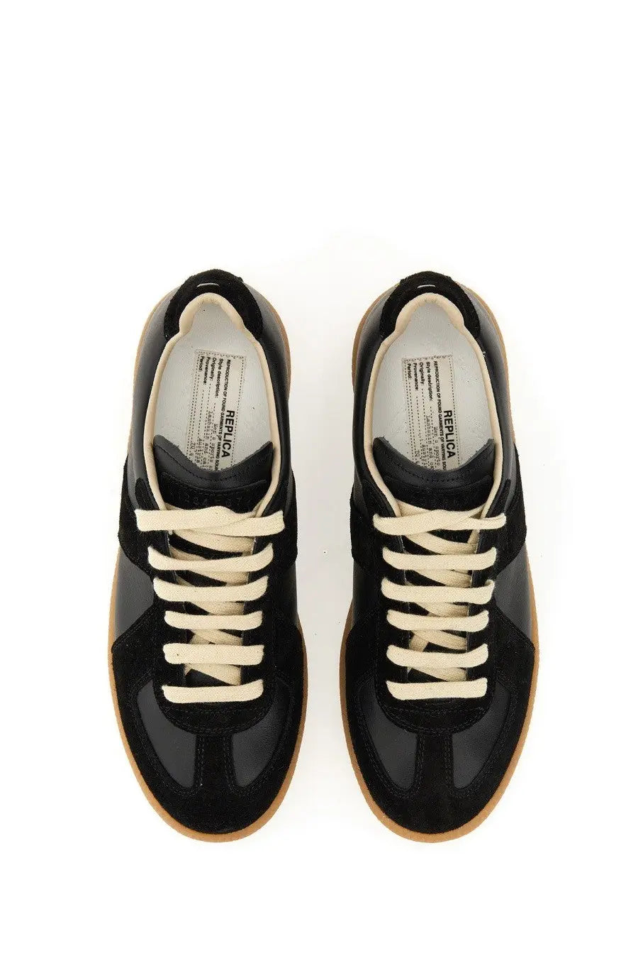 Maison Margiela women’s replica sneaker black low-top with black suede and leather, cream laces, and tan rubber sole