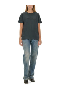Maison Margiela women’s black shirt made of dark gray fabric with short sleeves and a subtle embroidered chest logo
