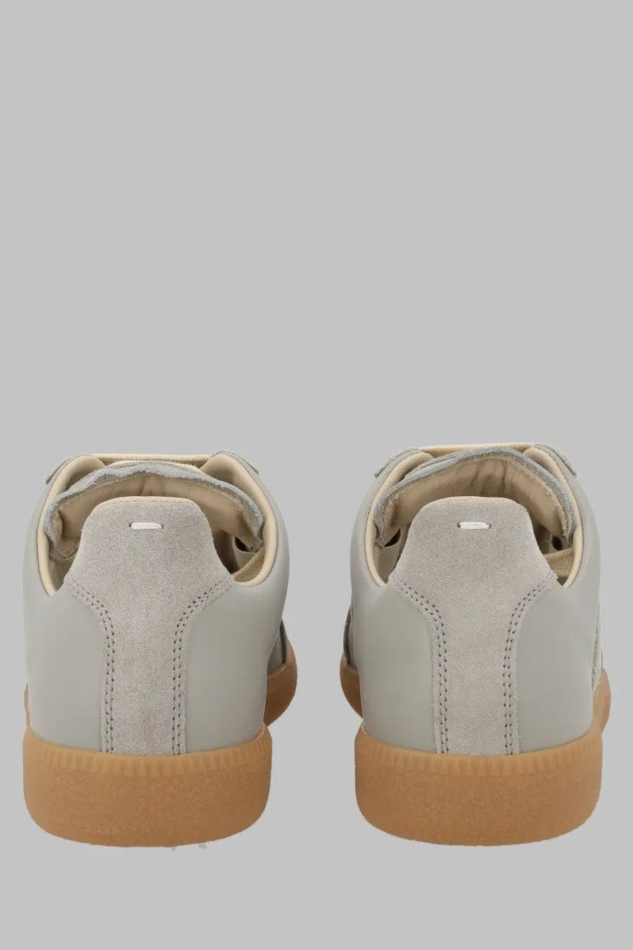 Maison Margiela women’s sneaker replica grey light gray suede with tan rubber sole and subtle stitching details