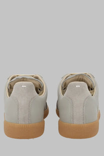 Maison Margiela women’s sneaker replica grey light gray suede with tan rubber sole and subtle stitching details
