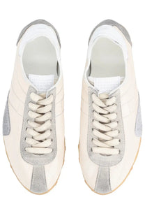 Maison Margiela women’s sneaker sprinters beige cream sneakers with silver suede accents and matching laces low-top design