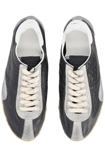 Maison Margiela women’s sneaker sprinters in black with silver croc-embossed leather, suede laces, and metallic accents