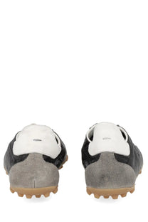 Maison Margiela women’s sneaker sprinters black black and white suede with gray heel counter and tan rubber sole