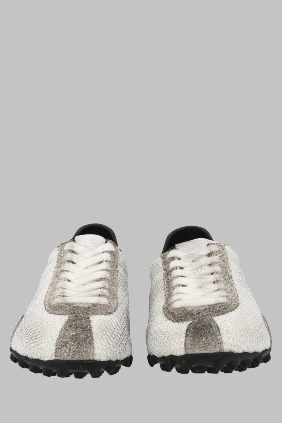 Maison Margiela women’s sneaker sprinters low top white snakeskin pattern with silver accents and black rubber soles