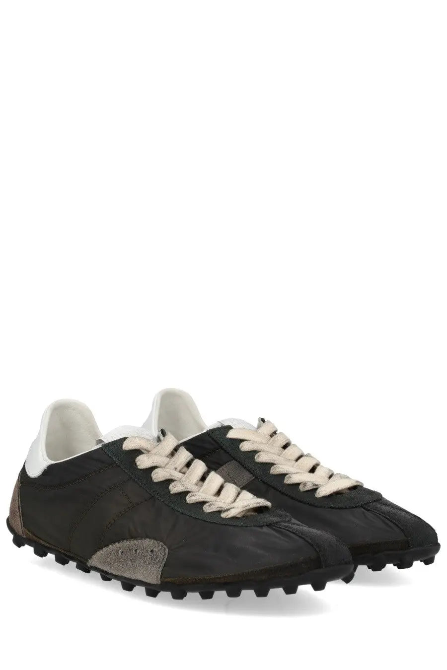 Maison Margiela women’s sneaker sprinters black and beige low-top with rugged textured upper and chunky rubber sole