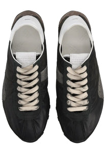 Maison Margiela women’s sneaker sprinters in black suede and nylon with gray accents white laces minimalist design