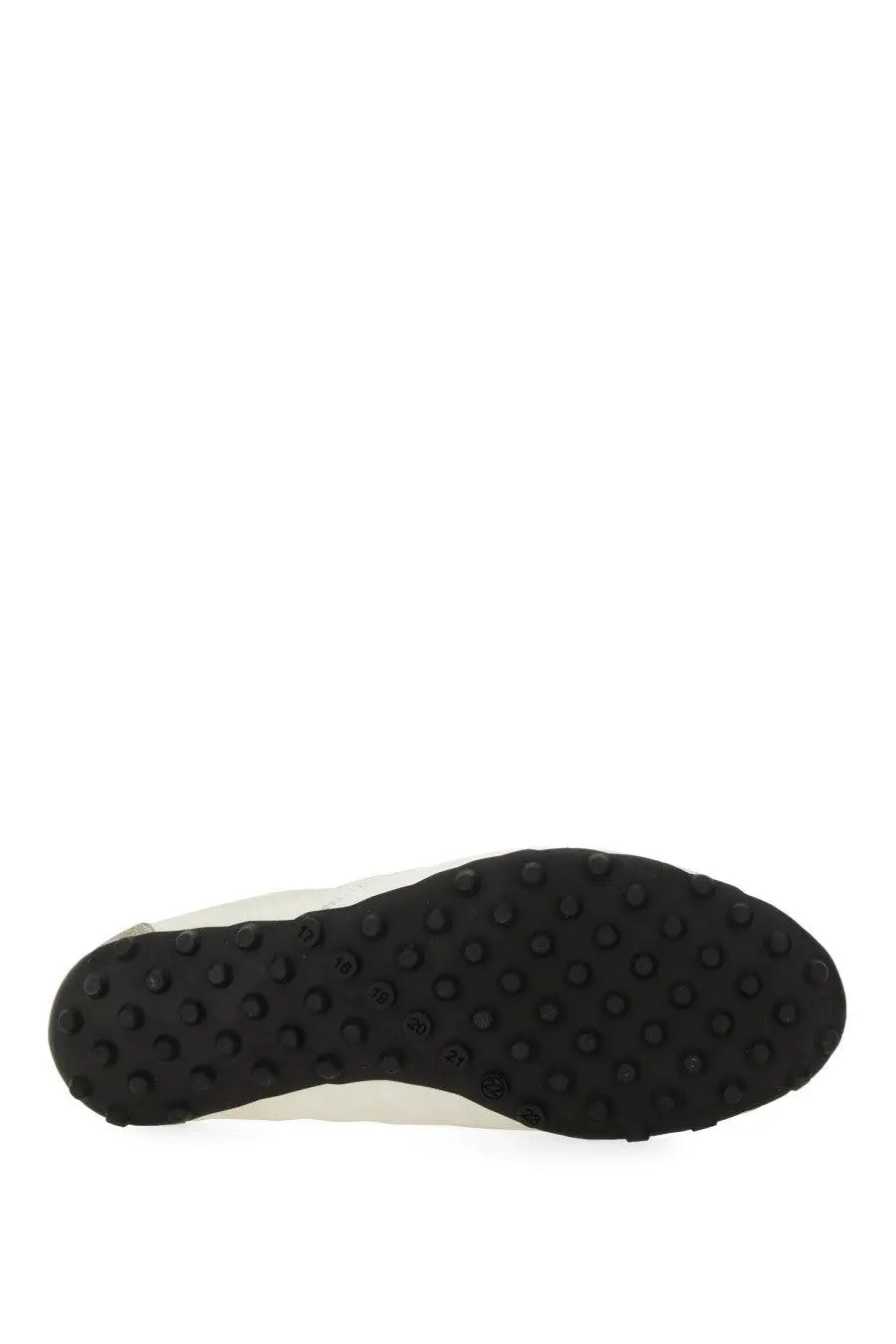Black rubber sole with raised circular studs on maison margiela women’s white sneaker sprinters