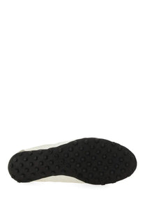 Black rubber sole with raised circular studs on maison margiela women’s white sneaker sprinters