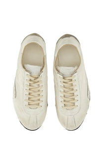 Maison Margiela women’s sneaker sprinters in cream-colored suede with distressed finish and black rubber soles