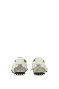 Maison Margiela women’s sneaker sprinters white with white leather, textured gray suede heel, and black rubber soles back view