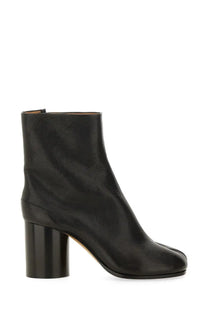 Maison Margiela women’s stivale tabi black leather ankle boot with chunky heel and minimalist design front view