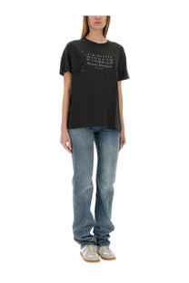 Black short-sleeved cotton t-shirt with white printed numbers and maison margiela text on the front for casual wear