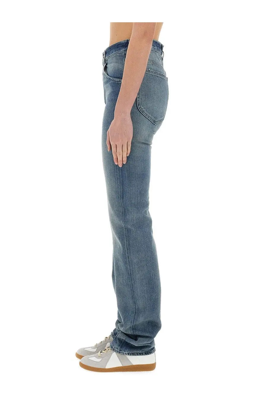 Maison Margiela women’s straight jeans in medium blue high-waisted denim with classic stitching and back pockets shown from back