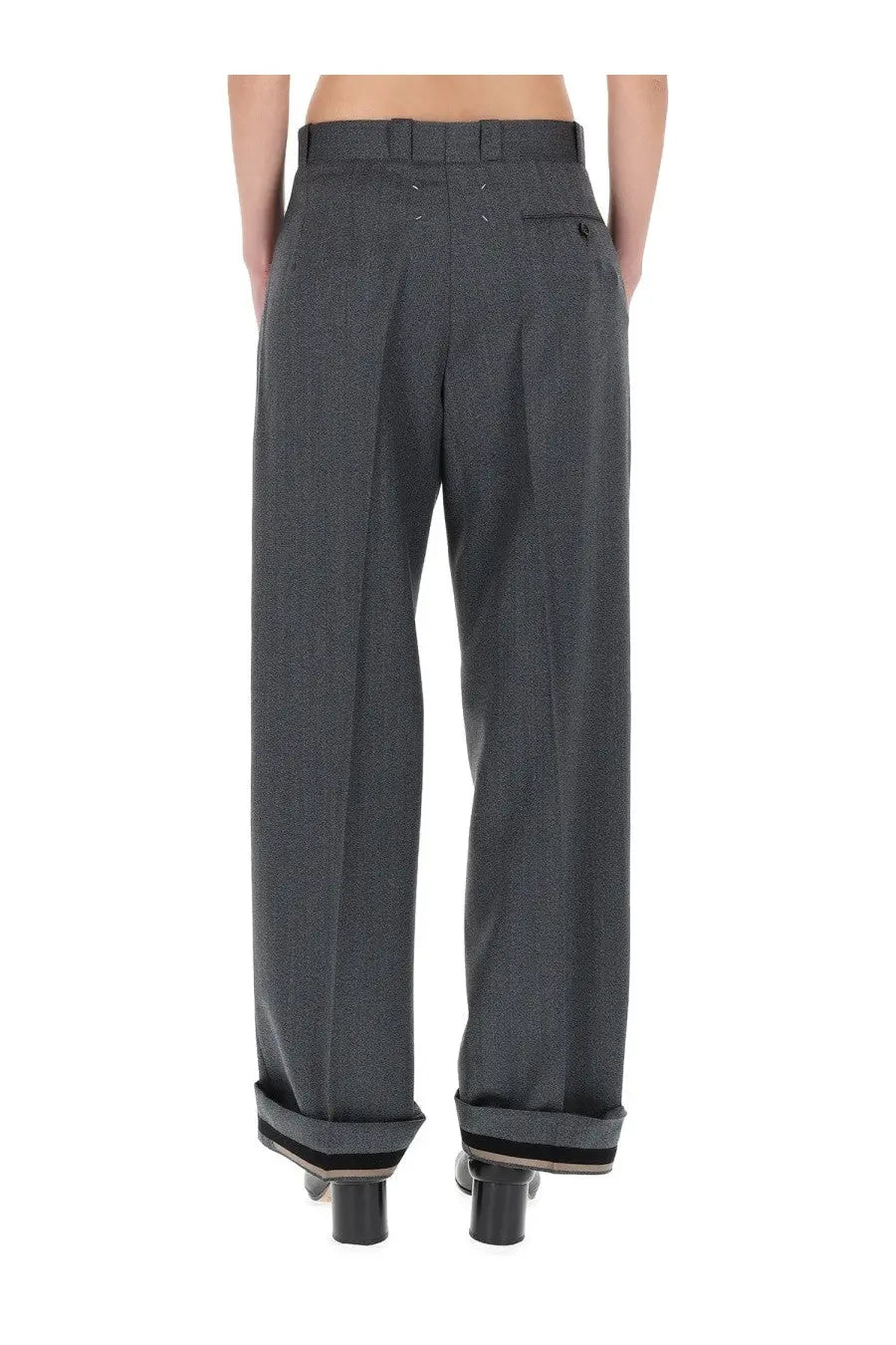 Maison Margiela women’s tailored grey trousers in dark gray textured wool with rolled cuffs and subtle stitching details