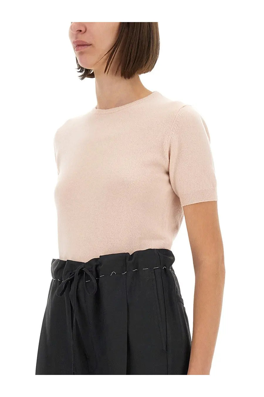 Maison Margiela women’s wool crew neck shirt in soft blush pink short-sleeved knit with round neckline and ribbed cuffs