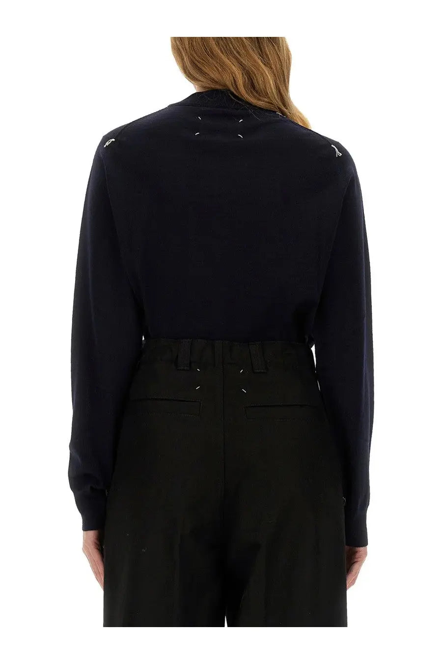 Maison Margiela women’s black wool jersey blouse with white stitching details at shoulders and neckline