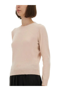 Maison Margiela women’s wool jersey blue features a soft blush pink long-sleeved knit sweater with round neckline