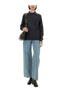 Black long-sleeved wool polo shirt with classic collar and button front from Maison Margiela womenswear