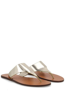 Manebi women’s gold metallic thong sandals with flat brown leather sole in pelle silver material