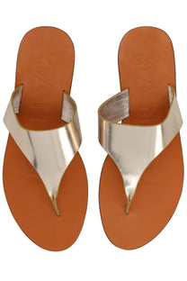 Manebi women’s gold-toned metallic thong sandals with tan leather sole in pelle silver style