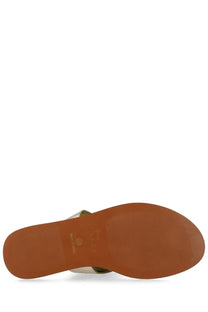 A tan rubber sole with textured grip and subtle branding on the back of manebi womens sandalo infradito in pelle silver