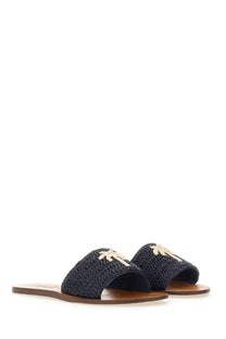 Manebi women’s navy blue woven slide sandals with gold palm tree embroidery on the strap