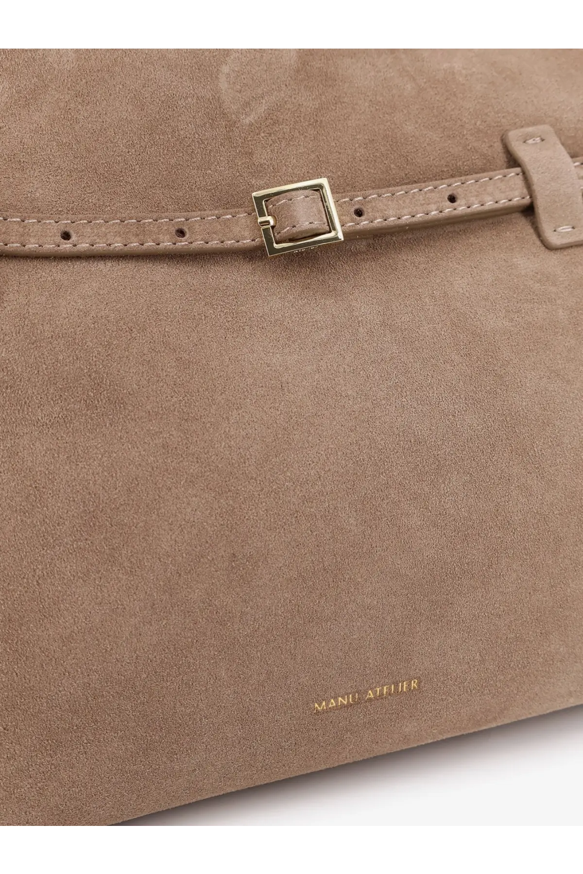 Tan suede shoulder bag by Manu Atelier with a gold-tone rectangular buckle and matching leather strap in brown