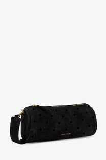 Manu Atelier women’s black suede mini cylinder crossbody bag with gold zipper perforated dot pattern and detachable strap