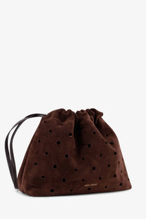 Manu Atelier women’s romy suede shoulder bag in brown with black circular perforations and matching leather strap