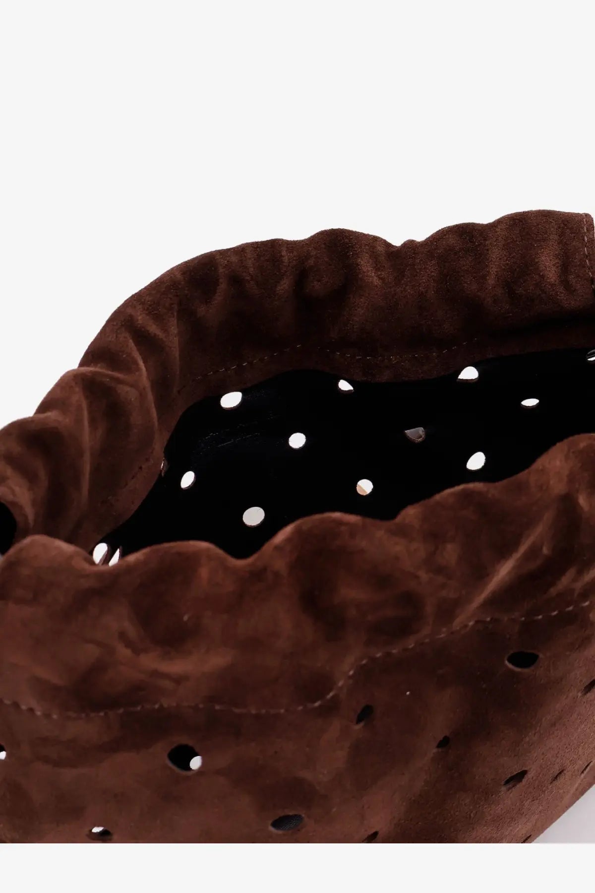 Manu Atelier women’s Romy suede shoulder bag in brown with scalloped perforated edge and black polka dot interior
