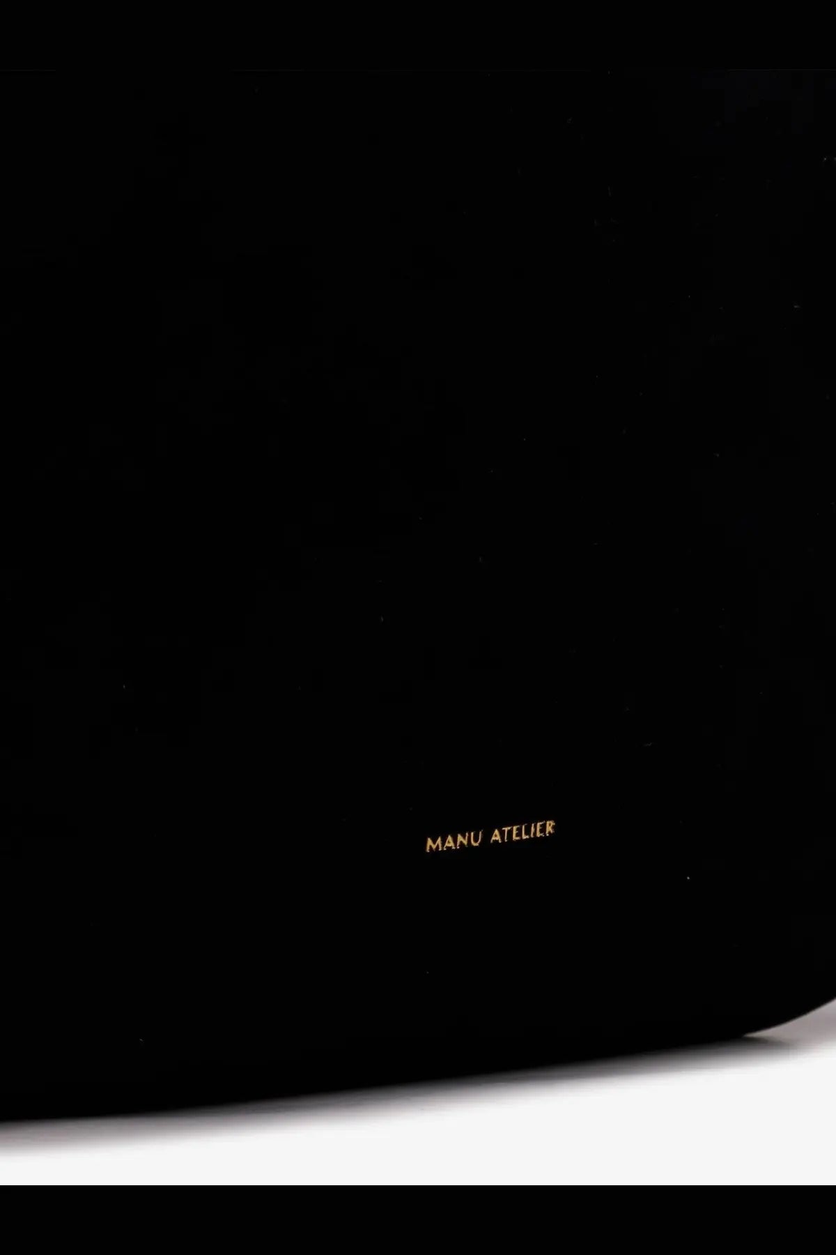 Black leather laptop sleeve with gold foil manu atelier branding for women’s tote du jour suede shoulder bag black