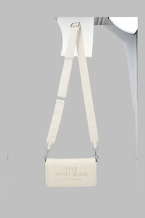 Marc Jacobs women’s borsa the leather mini bag white cream leather crossbody with embossed gold lettering and silver clasp