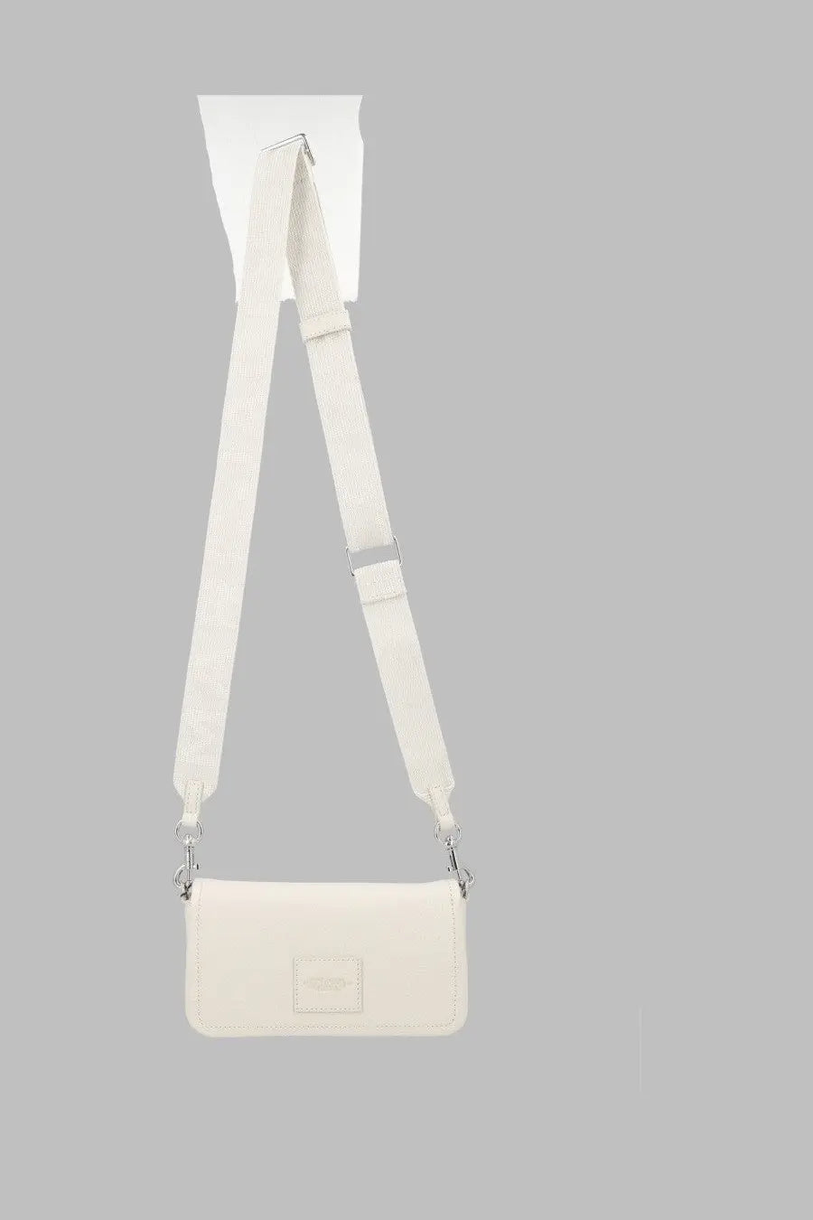 Marc Jacobs women’s borsa the leather mini bag white minimalist crossbody bag with sleek rectangular design and adjustable strap