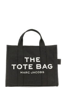 Marc Jacobs women’s borsa the medium tote black canvas bag with bold white the tote bag and marc jacobs lettering