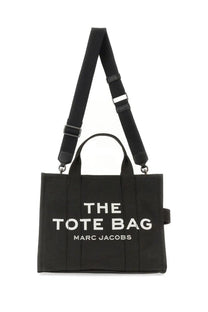 Marc Jacobs women’s borsa medium black canvas tote bag with white lettering and black adjustable strap